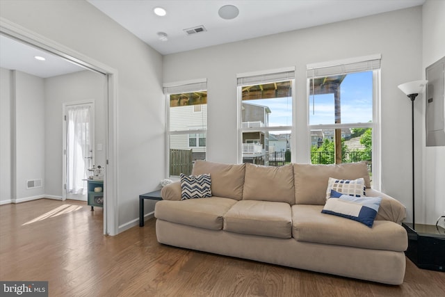 19961 Major Sq, Ashburn, VA 20147 - living room with wood finished floors, baseboards, and recessed lighting