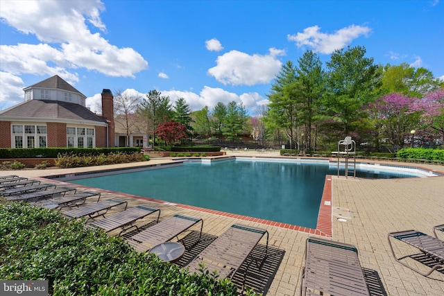 19961 Major Sq, Ashburn, VA 20147 - community pool featuring a patio area