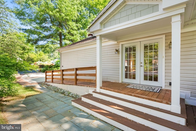 exterior space with french doors, a patio area, and a deck