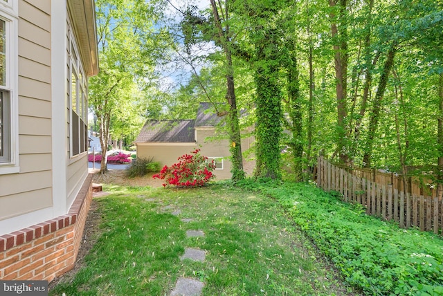view of yard featuring fence