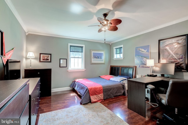bedroom with a ceiling fan, baseboards, crown molding, and dark wood-style floors