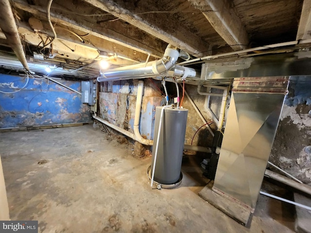 unfinished basement with electric panel and water heater