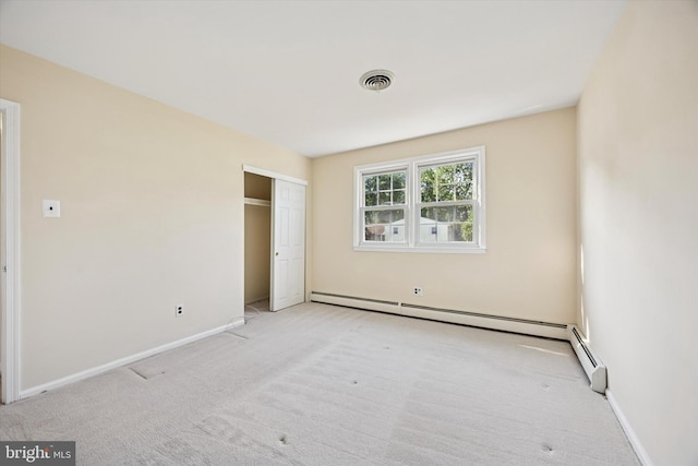 5 Morgan Rd, Aston, PA 19014 - unfurnished bedroom with carpet floors, a closet, and a baseboard heating unit