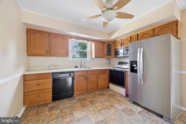 5 Morgan Rd, Aston, PA 19014 - kitchen with stainless steel appliances, light countertops, tasteful backsplash, brown cabinets, and ceiling fan