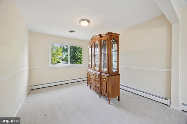 5 Morgan Rd, Aston, PA 19014 - carpeted spare room with a baseboard heating unit