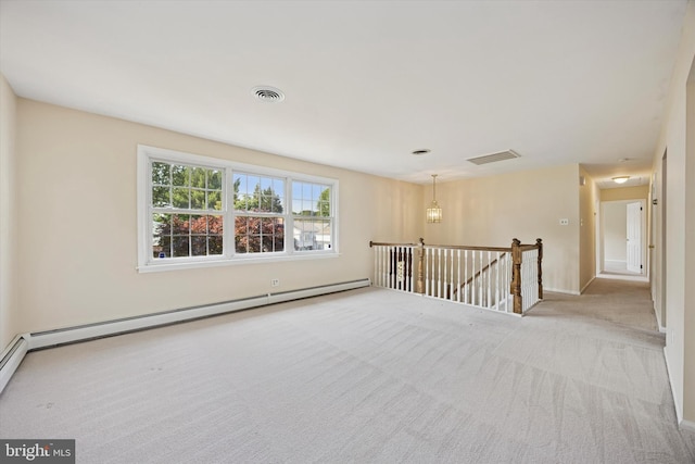5 Morgan Rd, Aston, PA 19014 - carpeted empty room featuring baseboard heating and baseboards