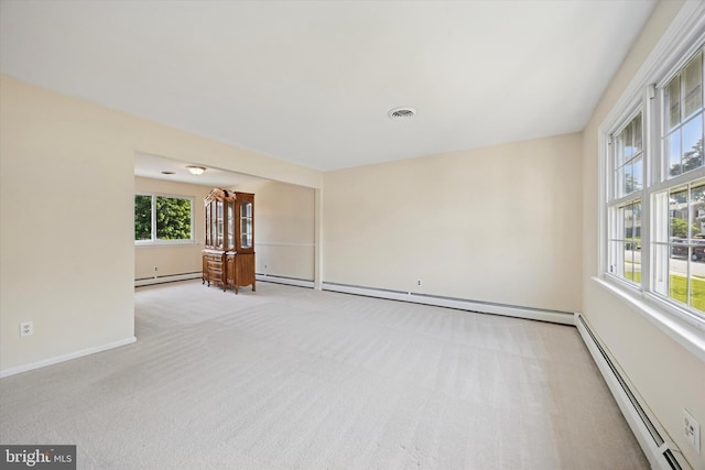 5 Morgan Rd, Aston, PA 19014 - unfurnished room with baseboard heating, healthy amount of natural light, and carpet floors