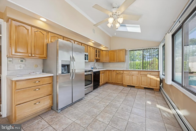 5 Morgan Rd, Aston, PA 19014 - kitchen with stainless steel appliances, a baseboard radiator, a skylight, a ceiling fan, and lofted ceiling