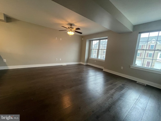 2102 E Oak Rd Unit E2, Vineland, NJ 08361 - spare room with dark wood finished floors, baseboards, a ceiling fan, and visible vents
