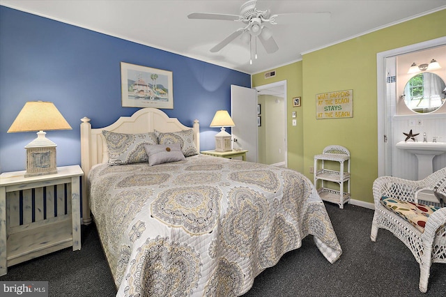 bedroom featuring ceiling fan, carpet, baseboards, visible vents, and ornamental molding