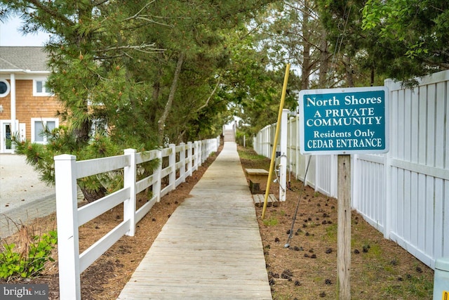 surrounding community featuring fence