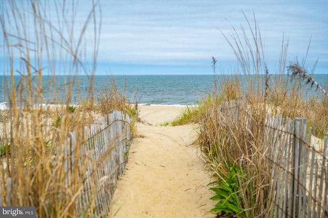 property view of water featuring a view of the beach