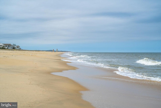view of water feature with a view of the beach