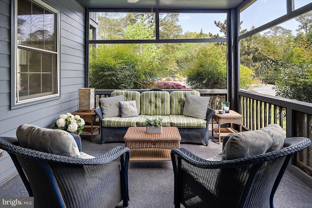 sunroom / solarium with an outdoor living space