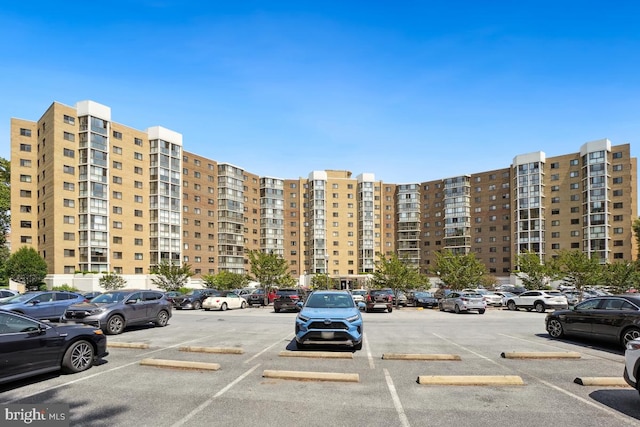 15100 Interlachen Dr Unit 4-522, Silver Spring, MD 20906 - view of apartment building / complex featuring uncovered parking