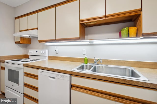 15100 Interlachen Dr Unit 4-522, Silver Spring, MD 20906 - kitchen with white appliances, under cabinet range hood, light countertops, and white cabinets