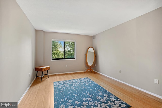 15100 Interlachen Dr Unit 4-522, Silver Spring, MD 20906 - unfurnished room with wood finished floors and baseboards