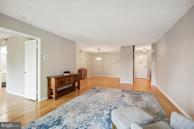 15100 Interlachen Dr Unit 4-522, Silver Spring, MD 20906 - living room featuring light wood-type flooring and baseboards