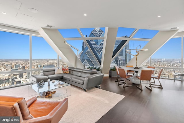 50 S 16th St Unit 5602, Philadelphia, PA 19102 - living room featuring expansive windows, plenty of natural light, wood finished floors, and a view of city