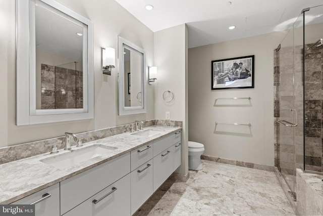 50 S 16th St Unit 5602, Philadelphia, PA 19102 - full bath featuring baseboards, a sink, double vanity, and a stall shower