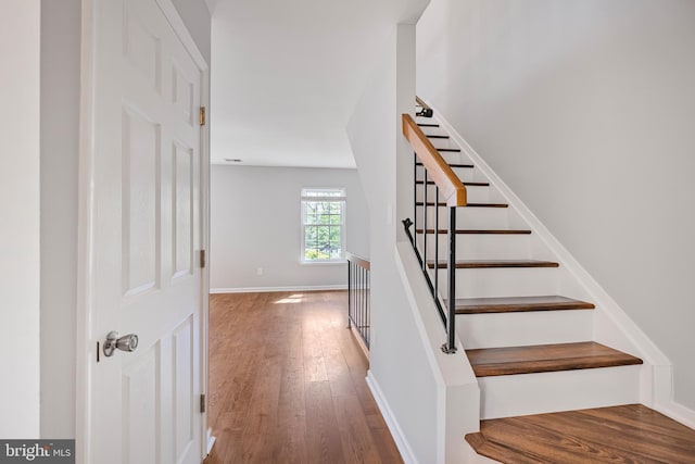 10310 Bridgetown Pl Unit 56, Burke, VA 22015 - stairs featuring wood finished floors and baseboards