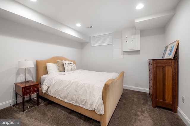 bedroom with visible vents, dark colored carpet, baseboards, and recessed lighting