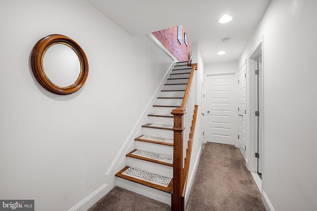 stairway featuring recessed lighting, carpet flooring, and baseboards
