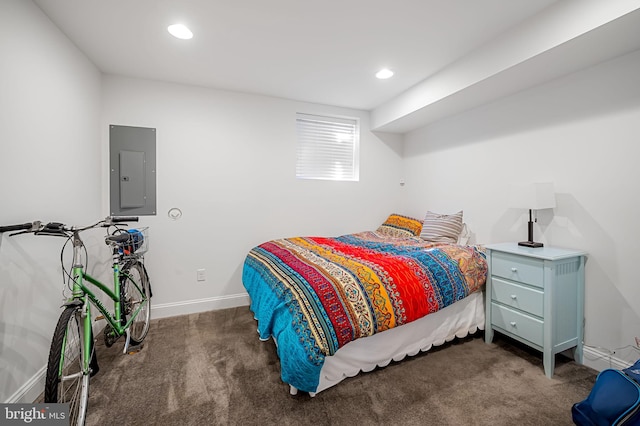 carpeted bedroom with electric panel, baseboards, and recessed lighting