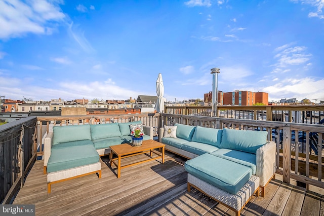 wooden terrace with outdoor lounge area