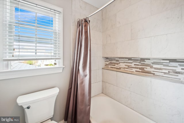 full bathroom with shower / bathtub combination with curtain and toilet