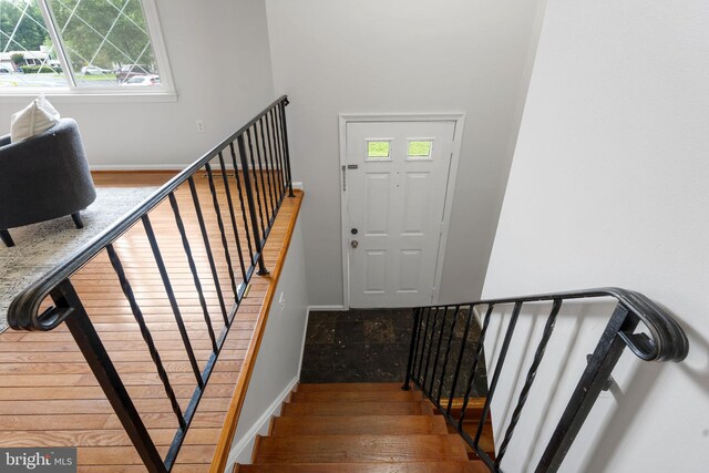 2116 Bell Tree Ln, Waldorf, MD 20601 - staircase with wood finished floors, plenty of natural light, and baseboards