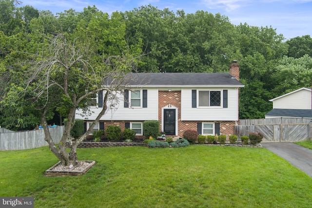 2116 Bell Tree Ln, Waldorf, MD 20601 - raised ranch featuring brick siding and a chimney