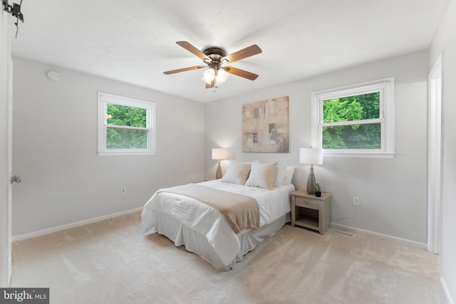 2116 Bell Tree Ln, Waldorf, MD 20601 - bedroom featuring light carpet, baseboards, and ceiling fan