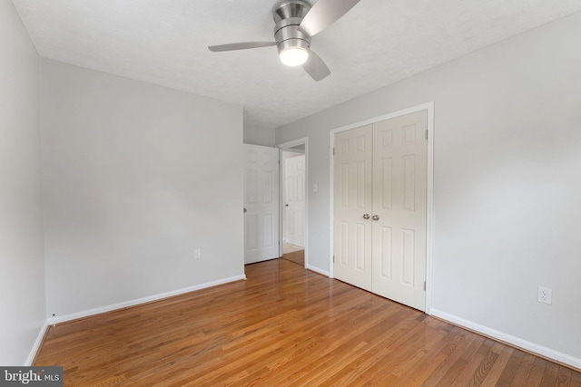 2116 Bell Tree Ln, Waldorf, MD 20601 - unfurnished bedroom with light wood-style flooring, baseboards, and a closet