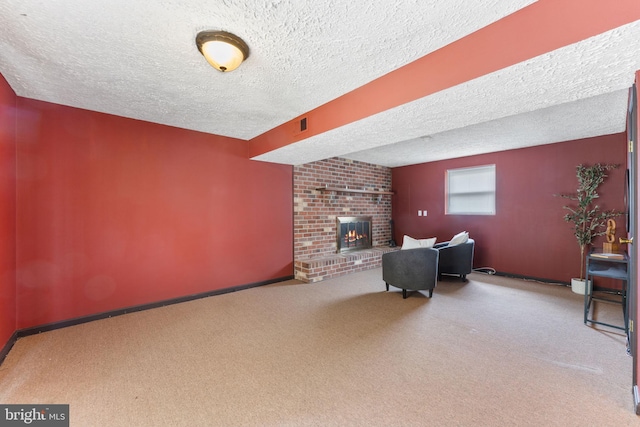 2116 Bell Tree Ln, Waldorf, MD 20601 - carpeted living area with a textured ceiling, a brick fireplace, and baseboards