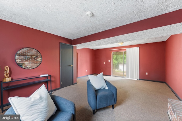 2116 Bell Tree Ln, Waldorf, MD 20601 - living area with a textured ceiling, baseboards, and carpet flooring