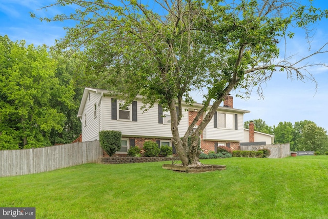2116 Bell Tree Ln, Waldorf, MD 20601 - view of front of home featuring a chimney and brick siding