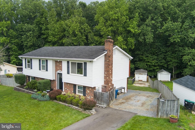 2116 Bell Tree Ln, Waldorf, MD 20601 - raised ranch featuring driveway, a chimney, brick siding, and a shingled roof
