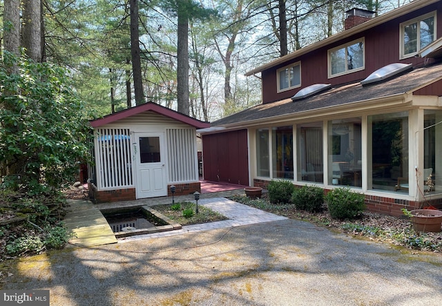 490 Orlando Ave, State College, PA 16803 - back of property with a chimney and an outdoor structure
