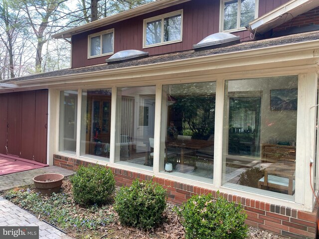 490 Orlando Ave, State College, PA 16803 - back of house with a sunroom and brick siding