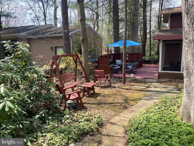 490 Orlando Ave, State College, PA 16803 - view of yard with a wooden deck