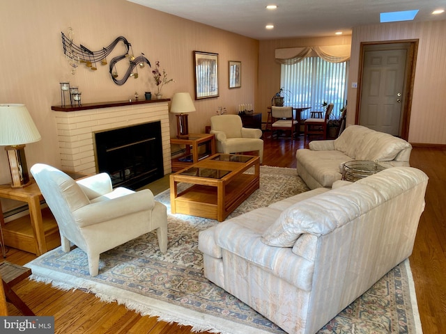 490 Orlando Ave, State College, PA 16803 - living area featuring wood finished floors, a fireplace, and recessed lighting