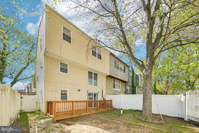 1943 Brookside Dr, Edgewood, MD 21040 - rear view of property featuring a gate, a fenced backyard, and a deck