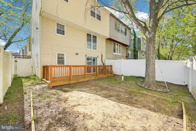 1943 Brookside Dr, Edgewood, MD 21040 - rear view of property featuring a fenced backyard, a gate, a residential view, and a deck