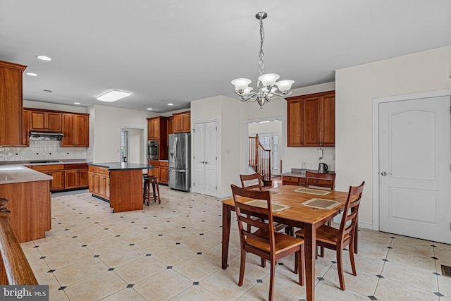 dining space featuring recessed lighting, light tile patterned flooring, stairs, and a notable chandelier
