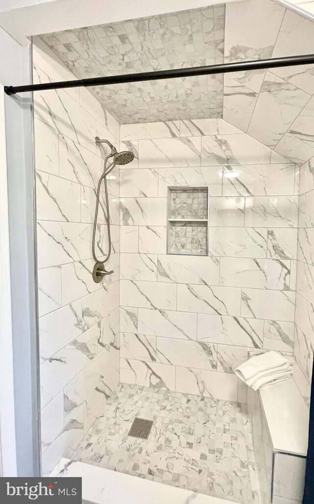 full bathroom with a stall shower