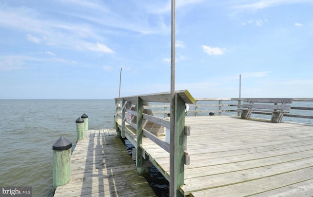 dock area featuring a water view