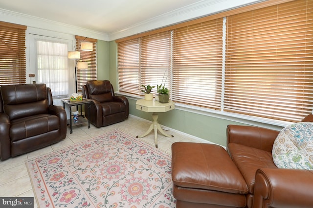 tiled living area with crown molding and baseboards