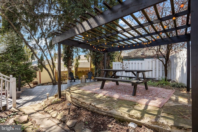 view of patio / terrace with a fenced backyard, a pergola, and a deck