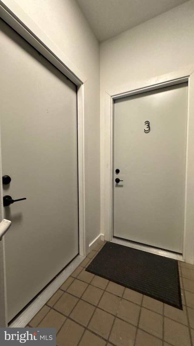 interior space with tile patterned flooring